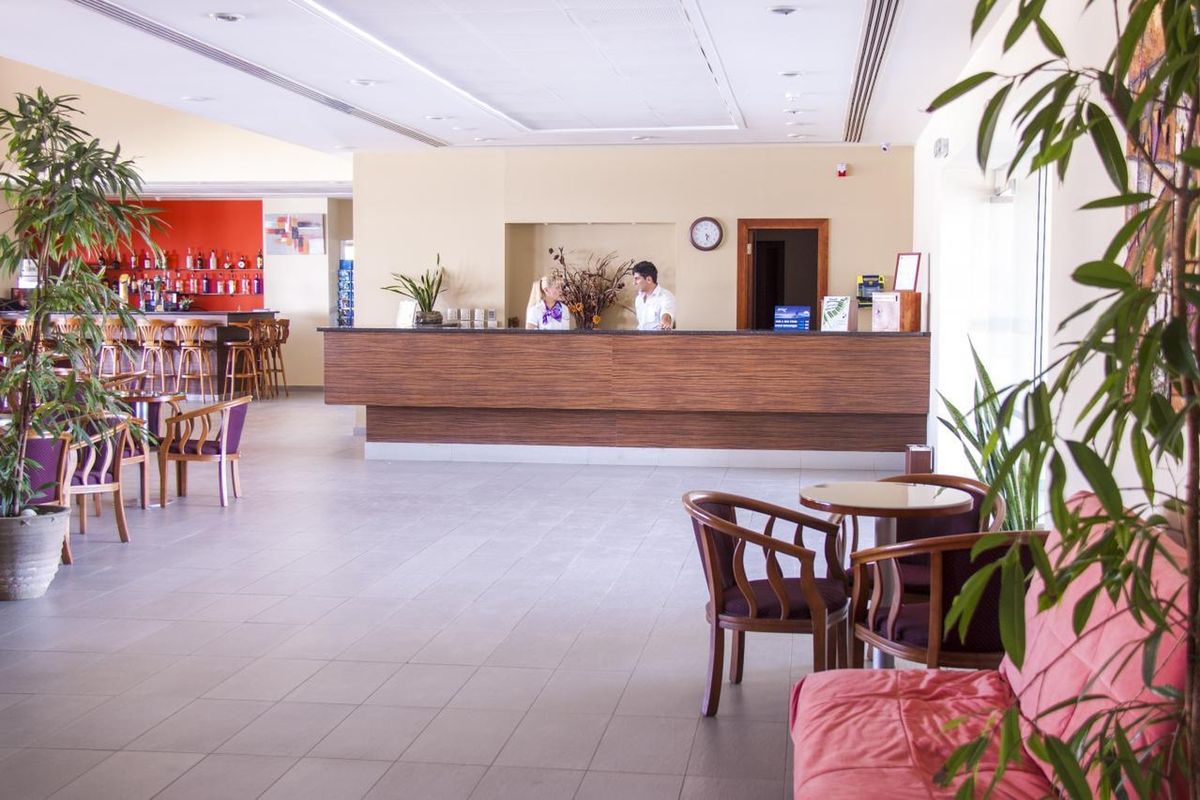 Theo Sunset Bay Holiday Village - recepcja / lobby