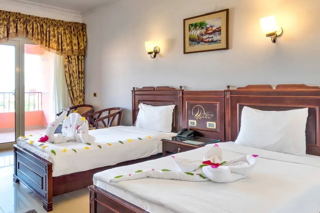 Three Corners Happy Life Beach Resort - pokój